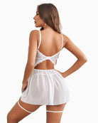 White lace babydoll back view with push-up bra, garter belt straps, and mesh mini skirt
