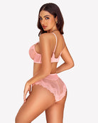 Pink lace bra and panty set shown from the side with sheer lace detailing
