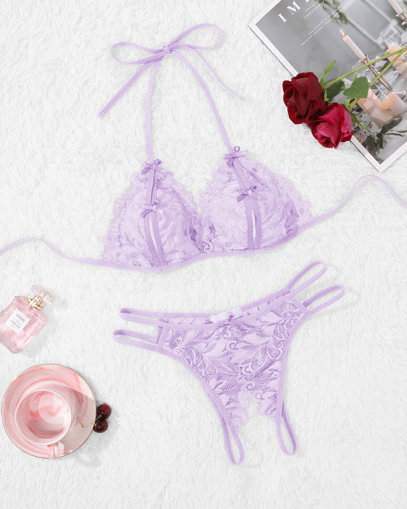 Lavender lace halter bra and lace panty set laid flat, tie-string details