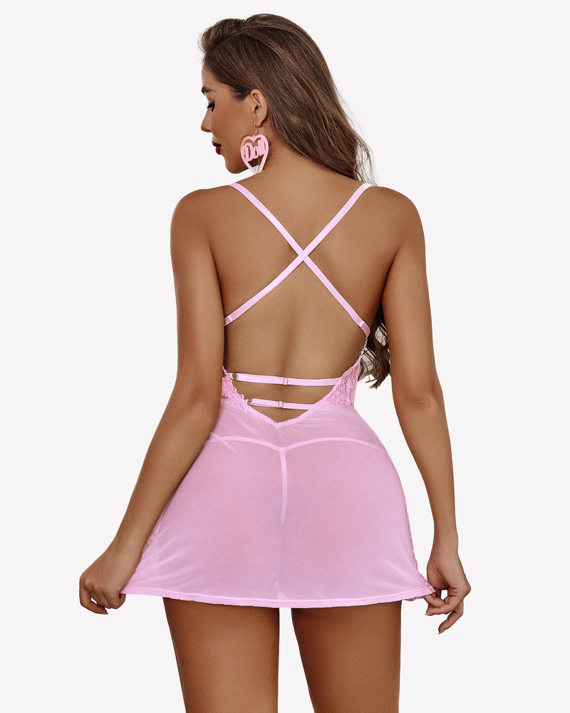 Pink lace chemise dress with crisscross back straps and short skirt