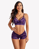 Purple lace bra and panty set with bow-front bralette and matching lace shorts