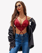 Red deep V teddy one-piece with lace floral cups and crisscross cut-out straps