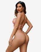 Light pink appliqued 2-piece bra and panty set with floral lace and thin straps at back