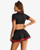 Black nurse cosplay set from back: tie-front crop top and pleated mini skirt with red trim