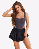 Black glitter ruffle mini skirt with elastic gathered waist and flared ruffle hem