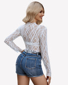 Sheer long-sleeve mesh top in white lace, back view with crisscross straps