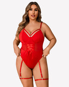 Red bodysuit with lace-up panel, sheer sides, and attached high-slit skirt
