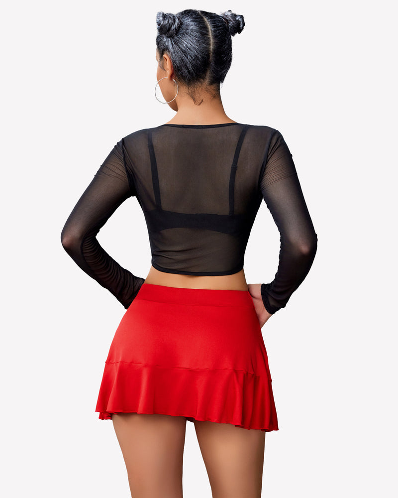 Red pleated wrap mini skirt, back view, with ruffle hem and tie strings
