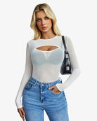 White sheer cut-out leotard with long sleeves, chest opening and high leg