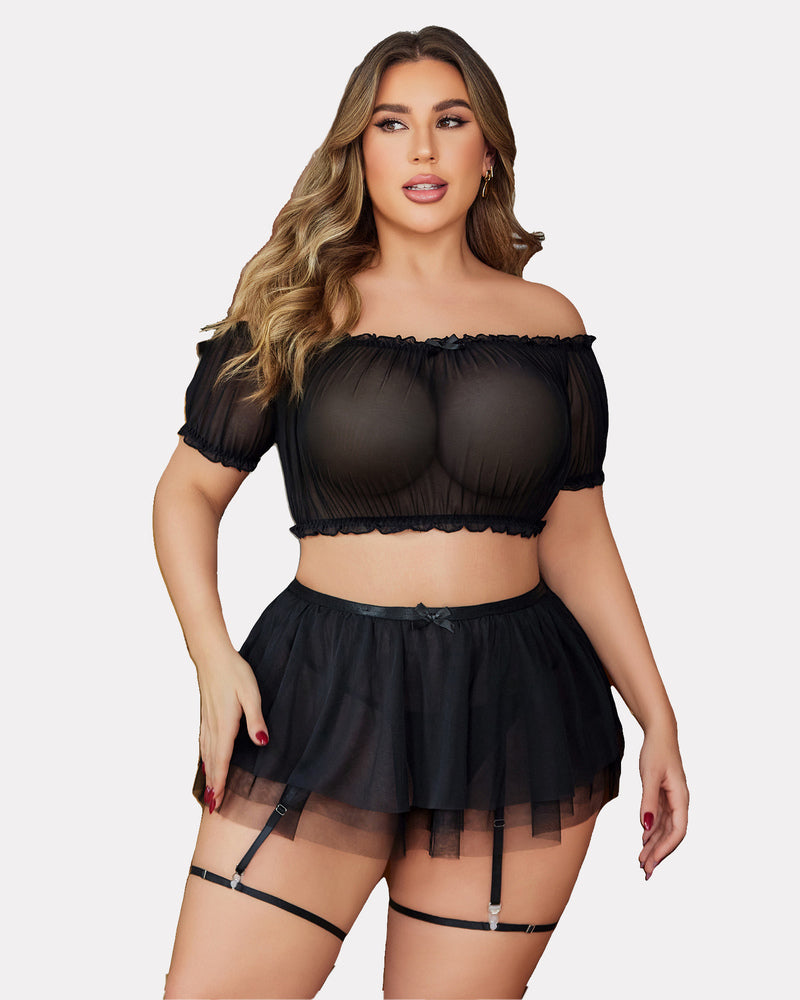 Black lingerie set with off-shoulder top, garter straps, sheer mesh skirt