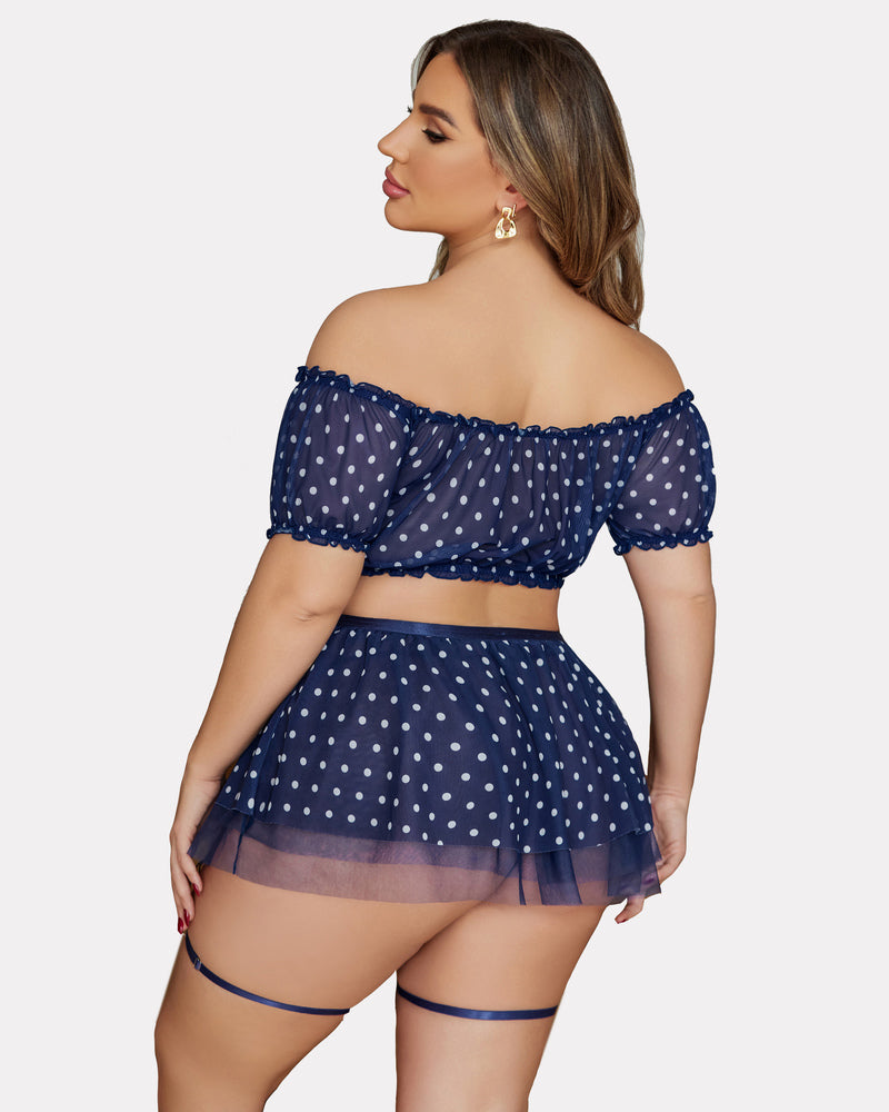 Plus size garter mesh set in navy with white polka dots, back view with off-shoulder top