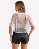 White sheer mesh crop top, back view with star-speckle pattern and short sleeves