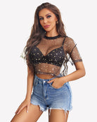 Black sheer mesh crop top with gold star print, V neckline, short sleeves