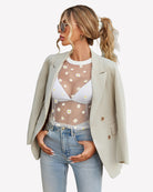 White sheer mesh crop top with daisy print, backless look under a blazer, short sleeves
