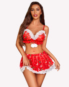 Red printed bra and mini skirt set with white lace trim and pom bow accent