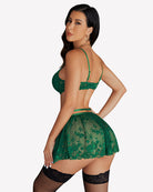 Green underwire lace lingerie with garter skirt, strappy bra, and lace stockings