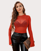 Rhinestone mesh top in red with long flared sleeves and V-style neckline detail