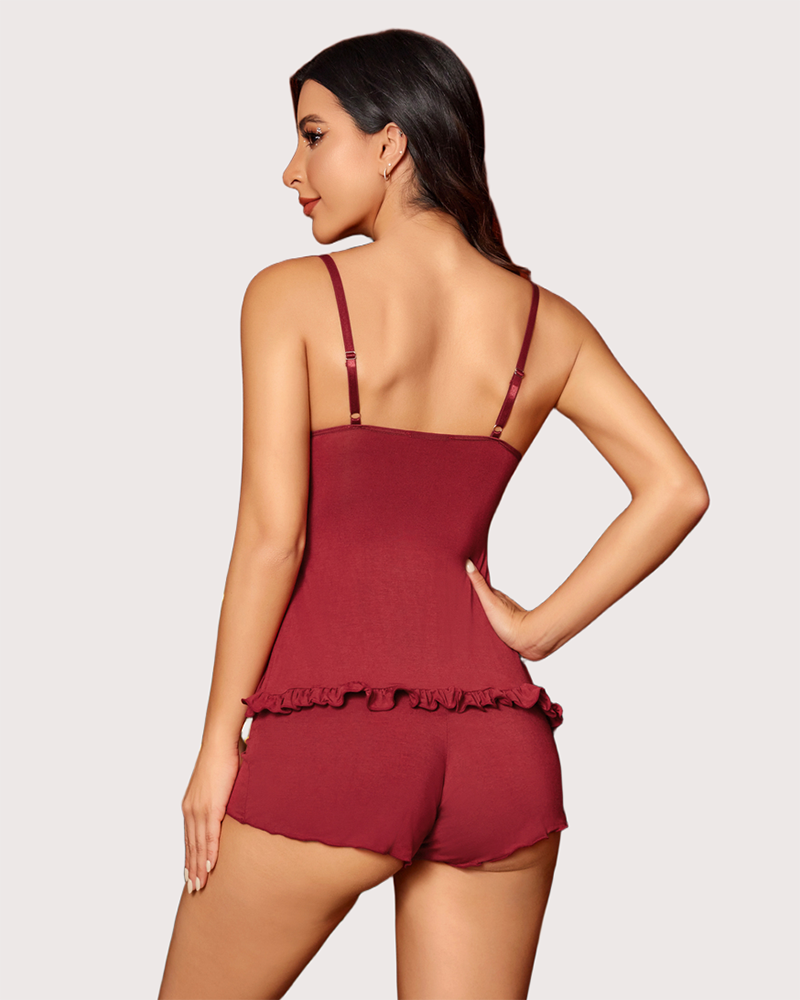 Wine red lace-trim pajama set, back view: camisole straps and matching ruffle shorts