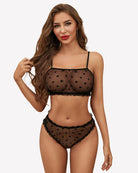Black mesh bra and panty set with polka-dot pattern and scalloped elastic trim.