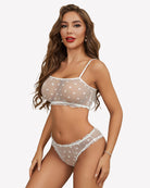 Mesh bra and panty set in white with light polka dots, lace trim and ruffled edges (side view)