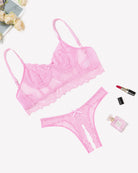 Pink lace bra and crotchless panty set with ruffled lace trim and thong-style back