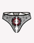 Black mesh floral embroidered thong panty with scalloped lace trim and crisscross straps.