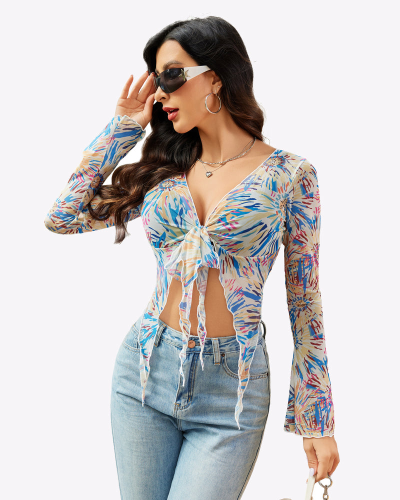 Mesh crop top with long sleeves, tie-front detail, and tropical floral print