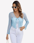 Light blue sheer mesh tie-front shrug top with V-neck ribbon and long sleeves