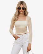 Champagne square-neck sheer blouse with long sleeves and lining, fitted