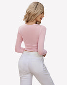Light pink sheer square-neck blouse from back view with long sleeves
