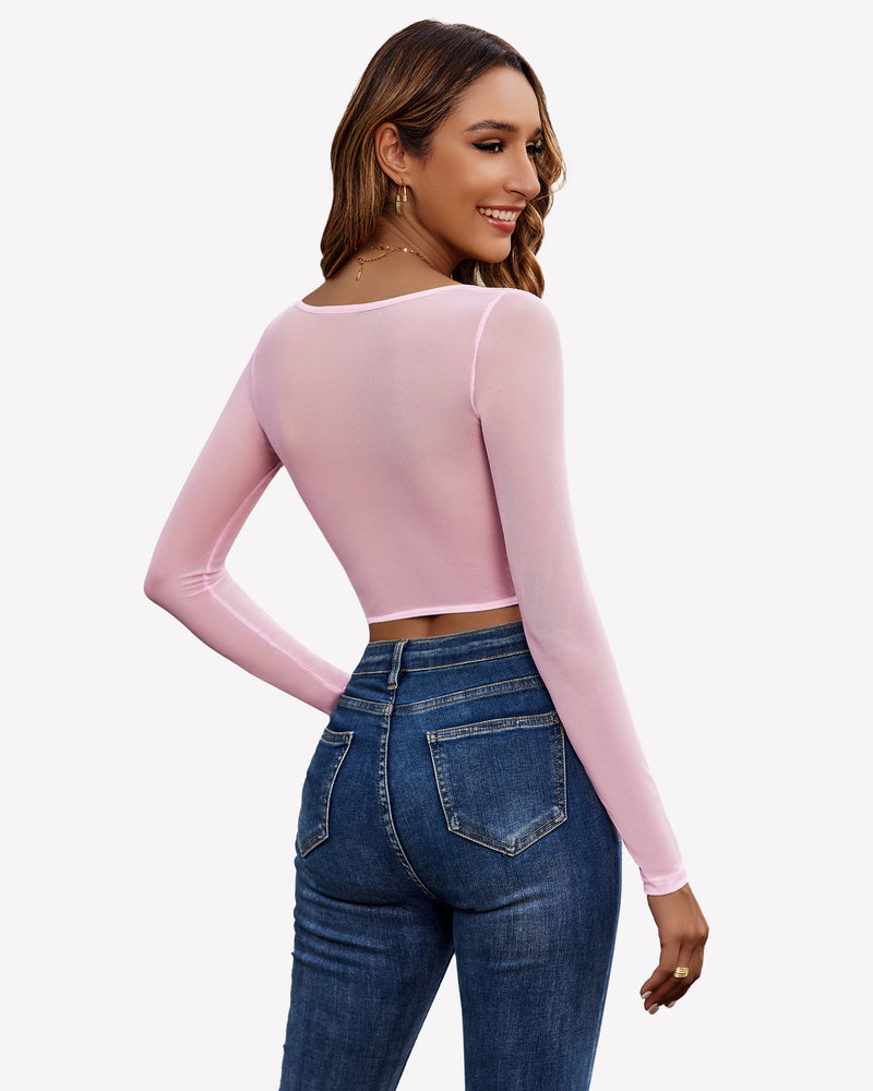 Pink sheer long-sleeve crop top with lace corset hem
