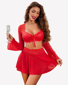 Red lace bra with tie front, matching short skirt and sheer long-sleeve mesh top