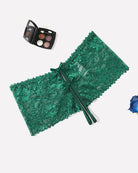 Green high-waist lace panty with scalloped trim and center ribbon bow