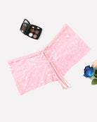 Pink high-waist lace panty with scalloped trim and center ribbon bow