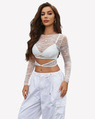 Mesh see-through long-sleeve shirt with lace under-bra, white front view with detailing.