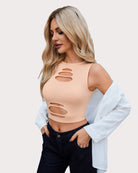 Beige cut-out crop tank top side view with oval cutouts on the front