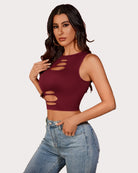 Burgundy cut-out crop tank top, sleeveless with oval cutouts along the front