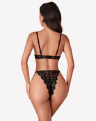 Black lace teddy one-piece lingerie shown from the back with lace trim and thin straps