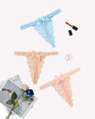 Floral lace panties with ribbon ties, light blue, beige, and peach