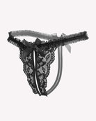 Black lace thong panties with wide ruffled waistband and two ribbon ties