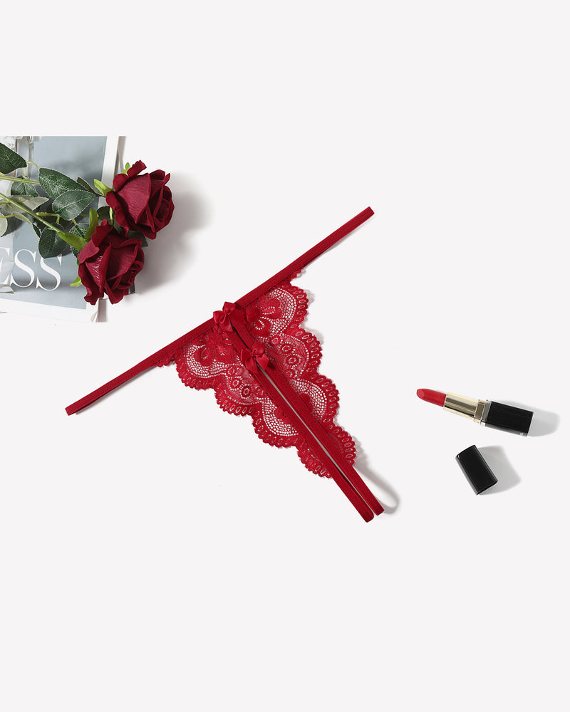 Red lace low-rise thong panties with bow detail and thin lace straps