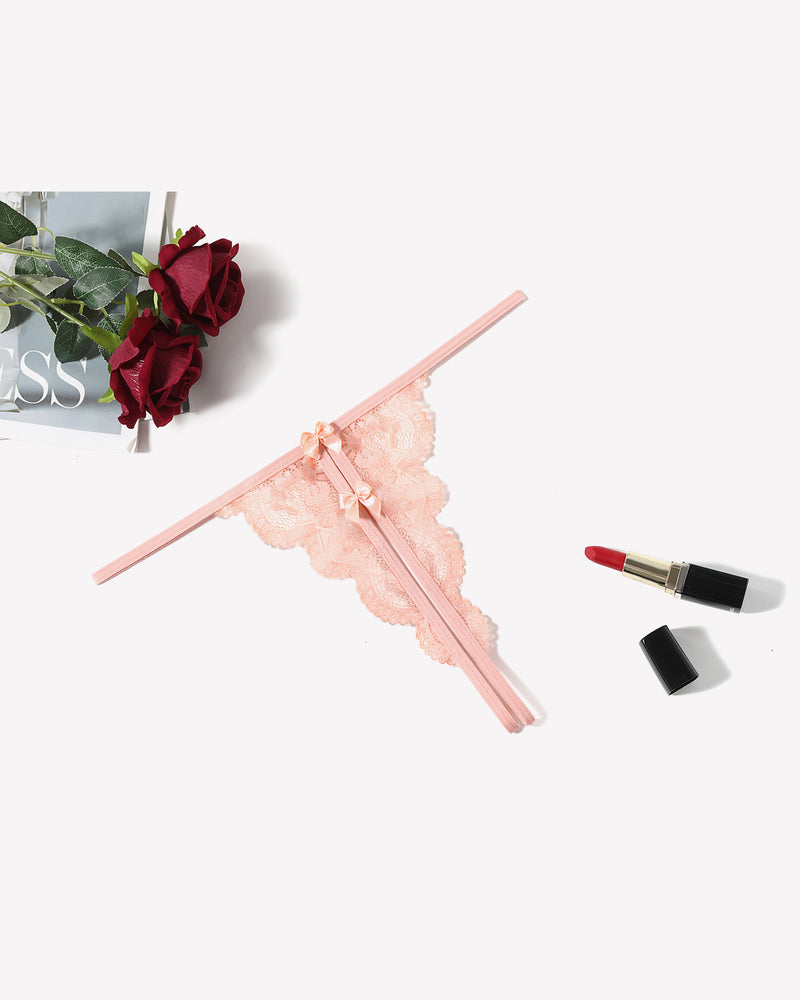 Pink lace low-rise thong panties with front bow and scalloped trim