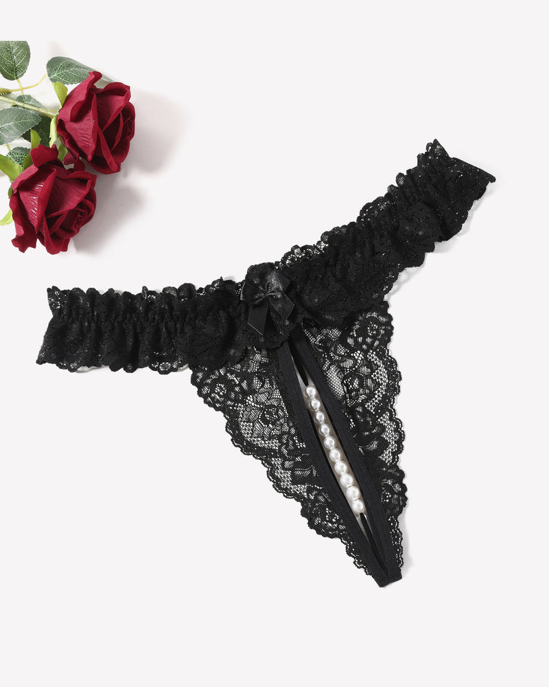 Black lace low-rise thong with ruffled band and pearl detail vertical ribbon
