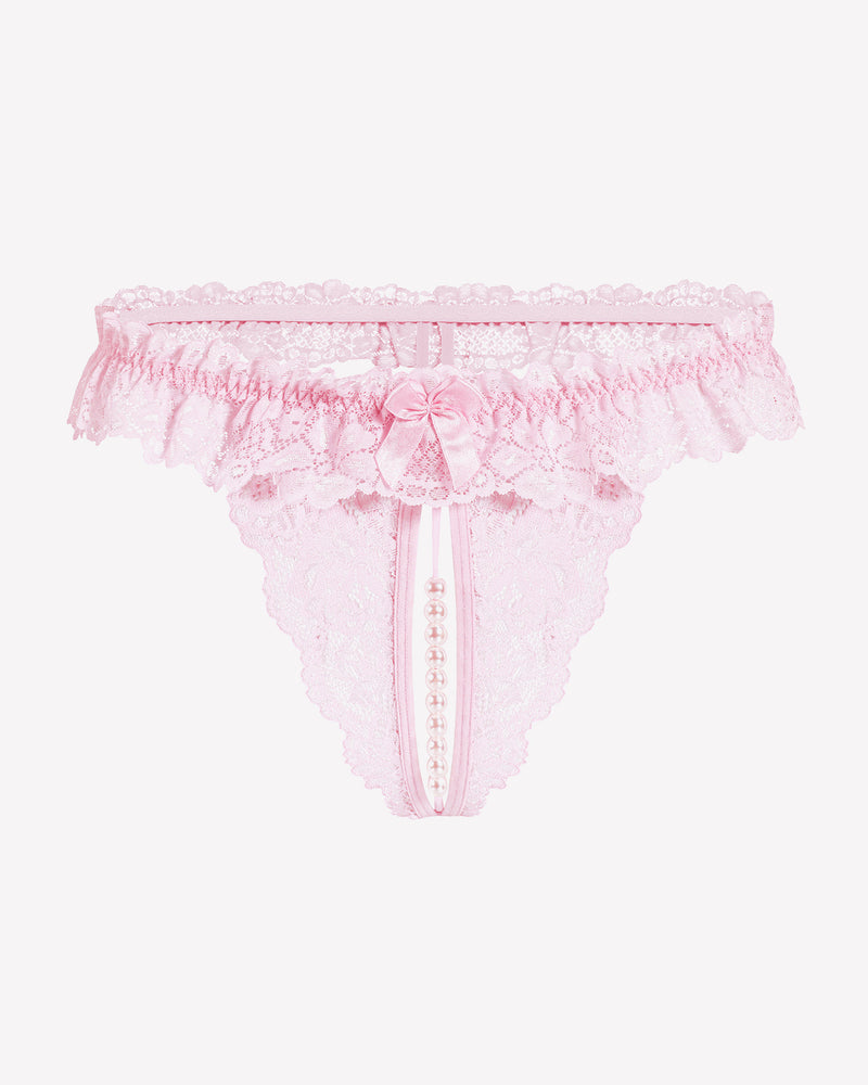 Low waist lace thong in pale pink with bow detail and pearl bead drop at center.