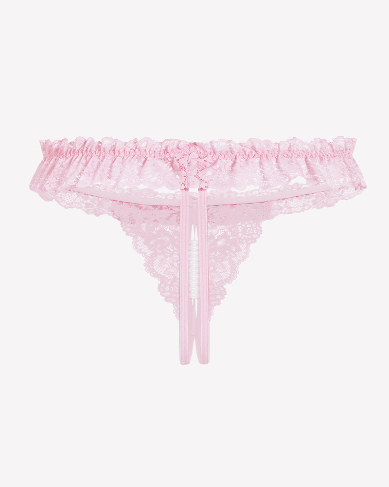 Pale pink lace low waist thong with bow trim and hanging pearl bead detail at front.