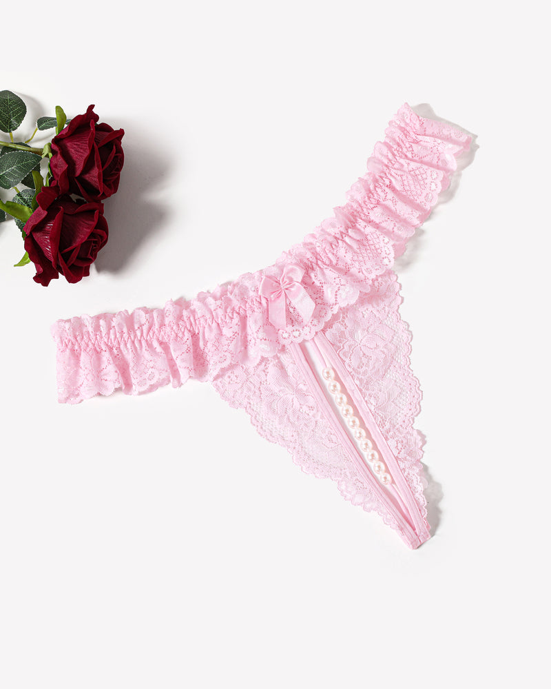Pale pink lace low waist thong with bow accent and pearl bead strap detail.