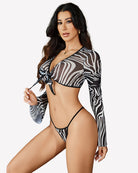 Sheer zebra-print long-sleeve crop top with g-string, deep V and tie-front bow.