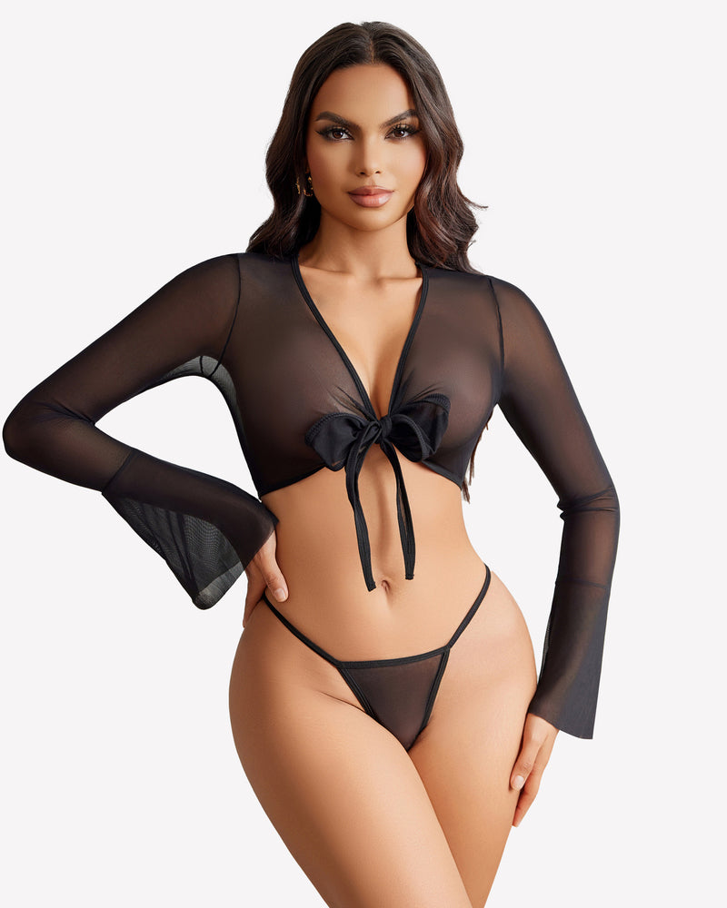 Sheer black long-sleeve crop top with bow tie and matching g-string thong.
