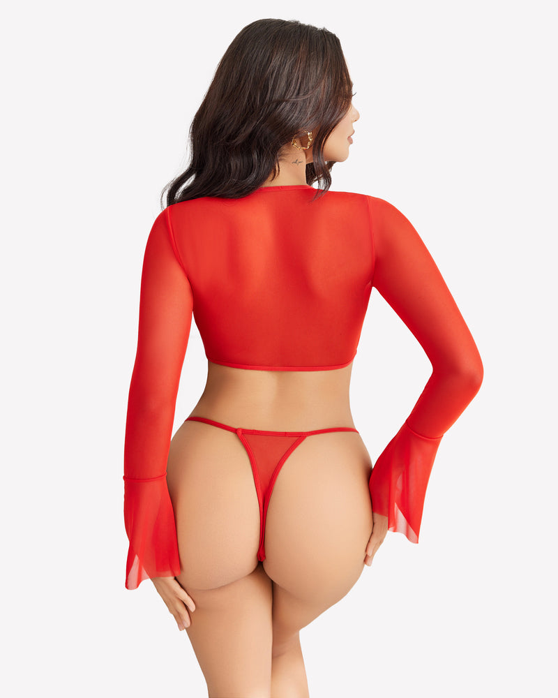 Sheer red long-sleeve crop top from back with matching g-string thong.