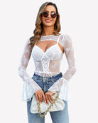 White lace bodysuit with crop top, underbust corset seams, long flared sleeves